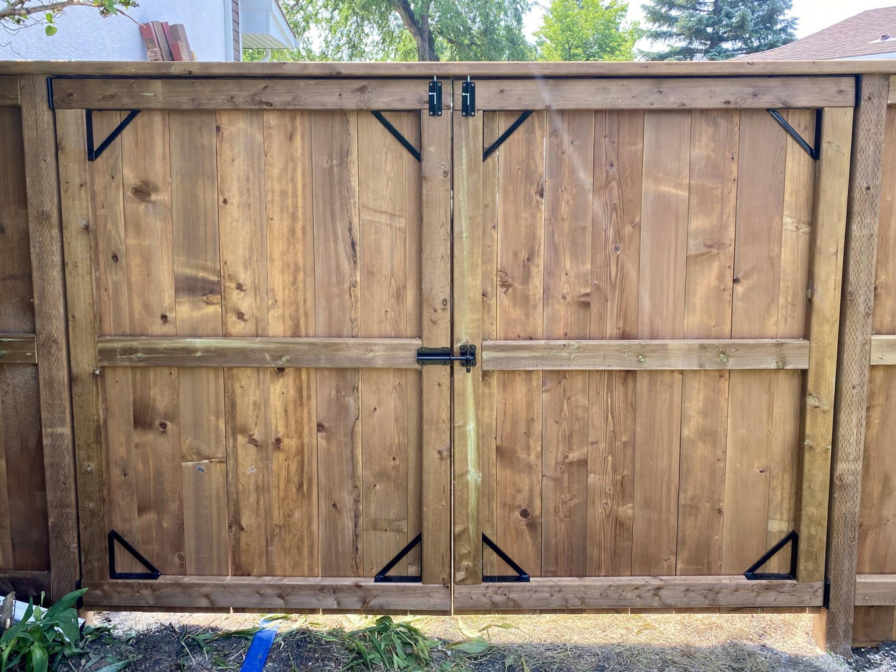  <p>Marc LaBossiere photos / Free Press</p>
                                <p>The double gate is reinforced by a 2 x 6 cap that spans from gate post to gate post.</p> 