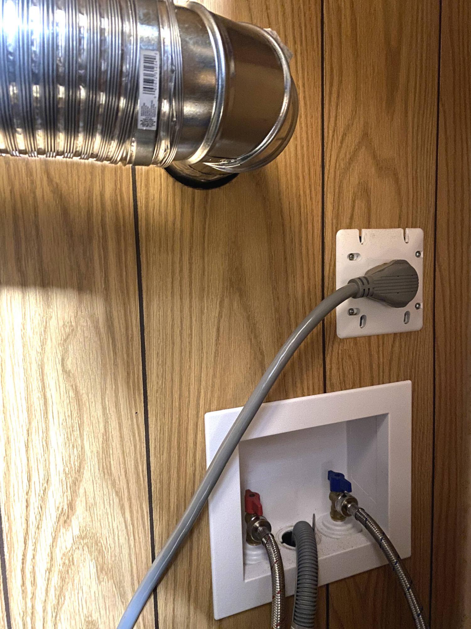  <p>Marc LaBossiere / Free Press</p>
                                <p>The dryer duct and vent, new 30-amp outlet, and ABS drain plus water feeds combo insert make for a clean look along the back wall.</p> 