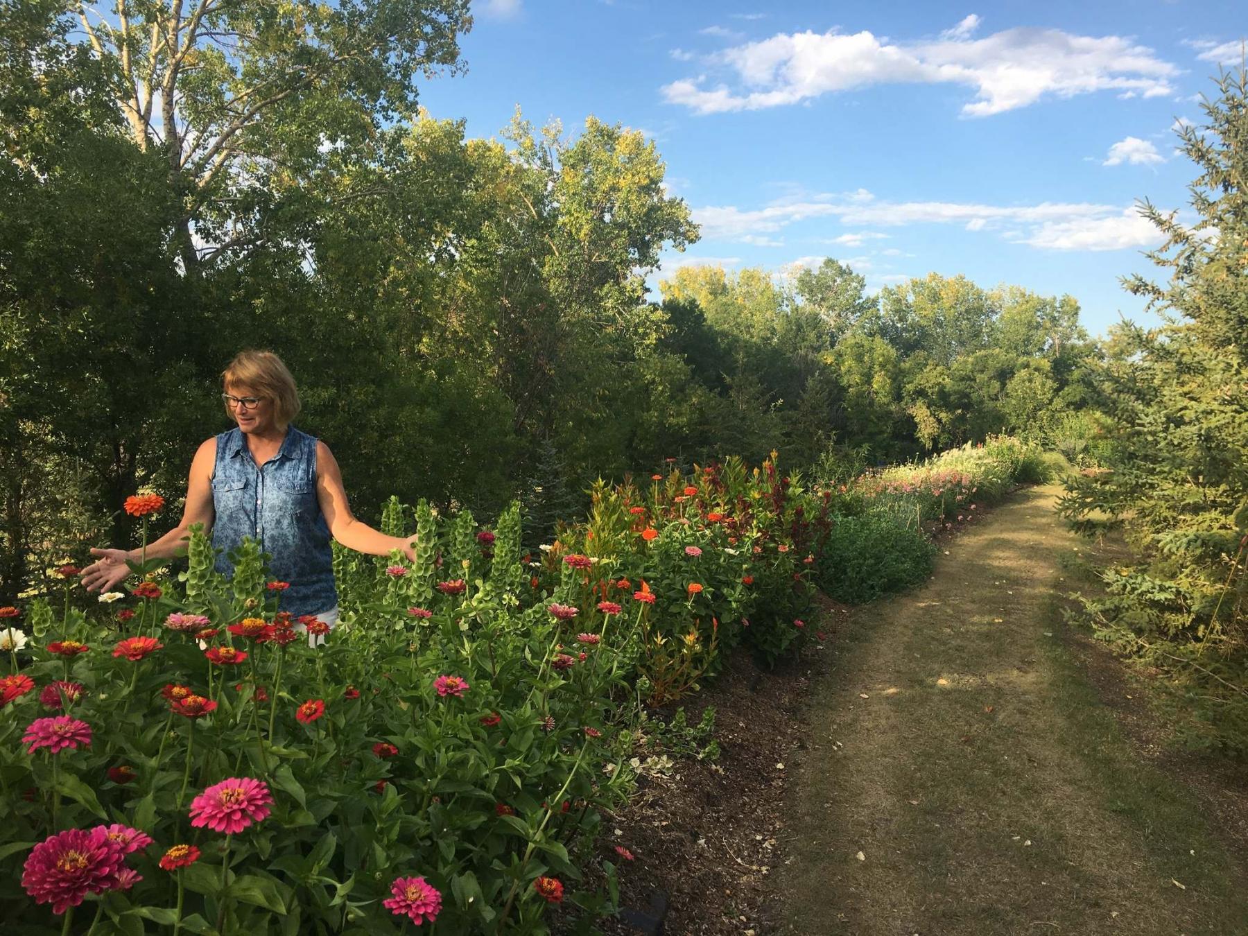 <p>Photos by Angela Neufeld</p><p>Terry Neufeld, owner of Sweet Petals Farm, is making plans to grow her flower business.</p>