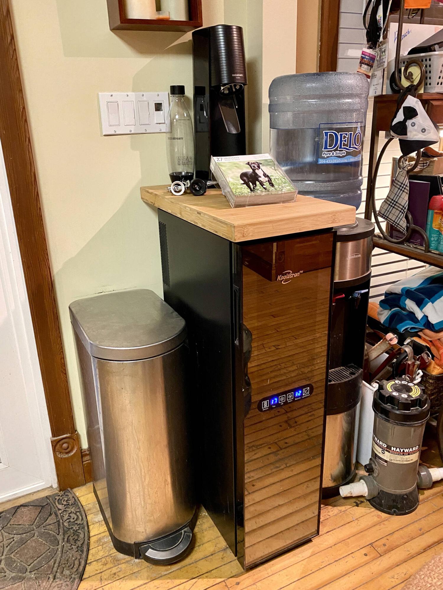  <p>Photos by Marc LaBossiere / Winnipeg Free Press</p>
                                <p>After a power outage fried the old wine cooler circuitry, a new wine cooler was installed and fitted with a bamboo countertop cut from remnants of a previous project.</p> 