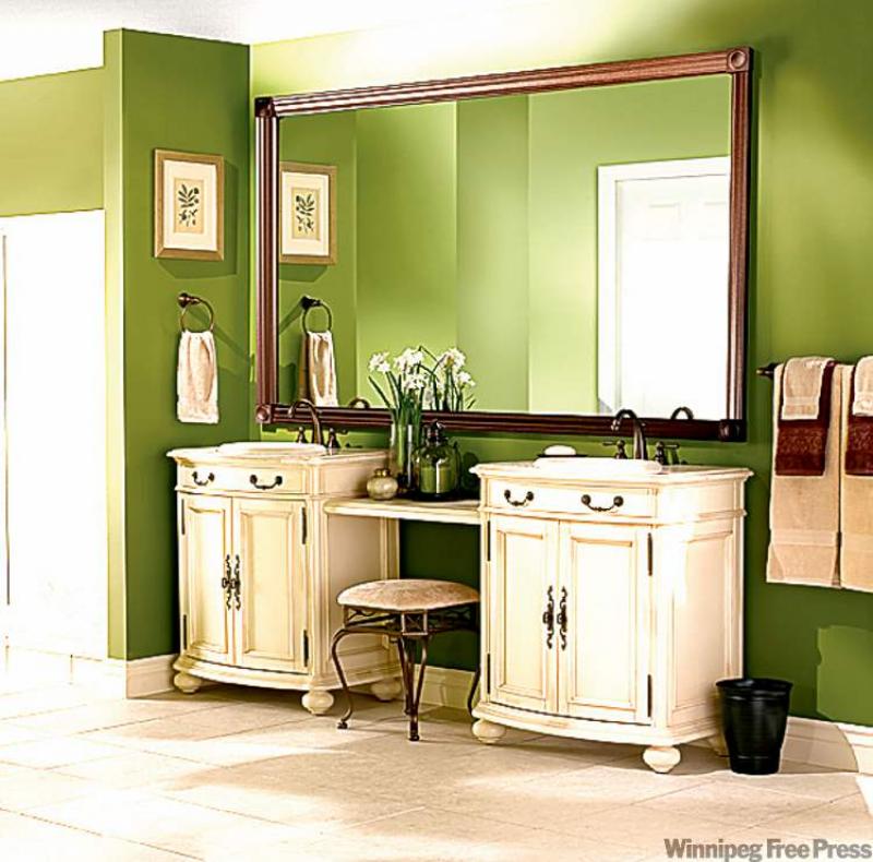 This oversized Moen mirror has a replica frame.
