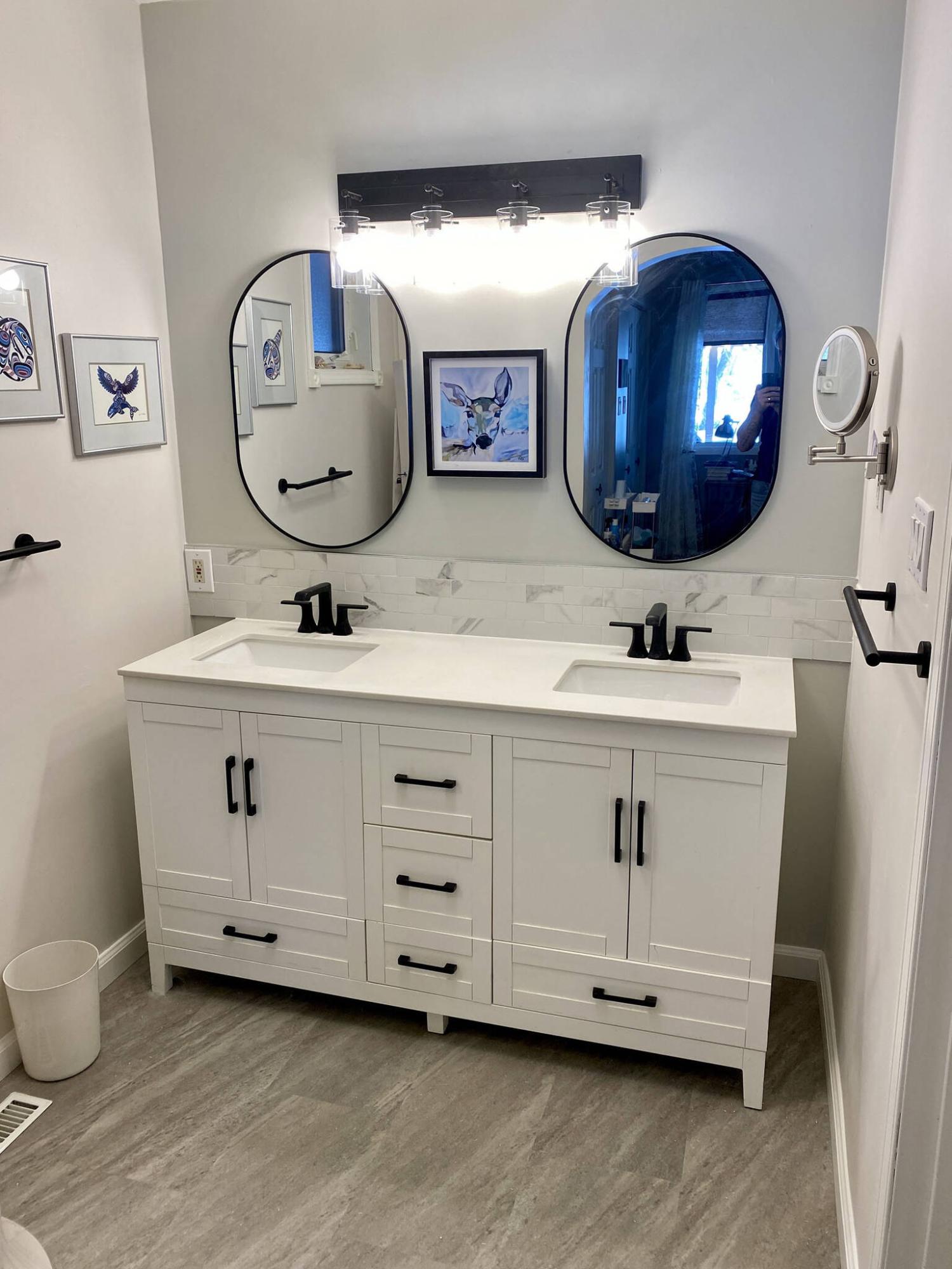  <p>PHOTOS BY Marc LaBossiere / Free Press</p>
                                <p>Although repurposed, the existing vanity gets new life with the introduction of a tiled backsplash above, and black features throughout.</p> 