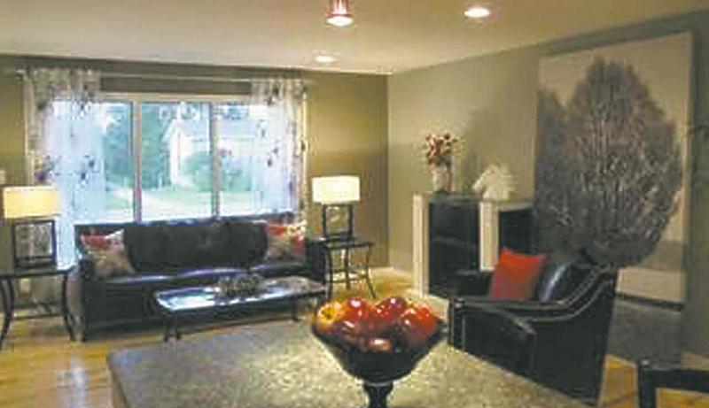 This living room is staged with just the right amount of furniture and accessories