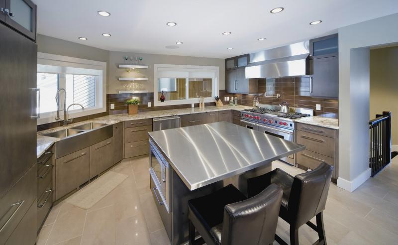 Redesigned kitchen includes modern amenities and a more contemporary look. 