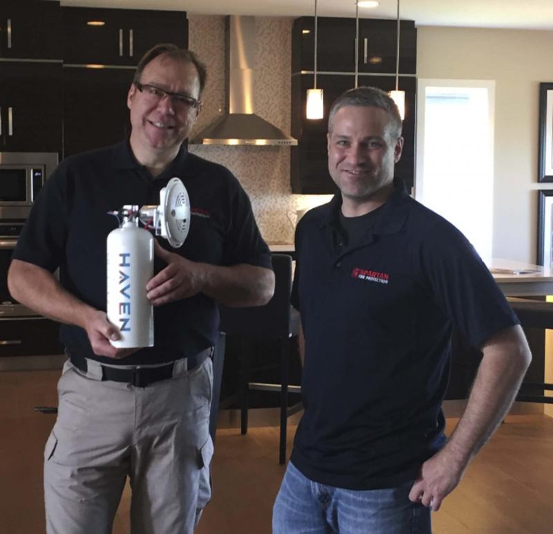 <p>Spartan Fire Protection&rsquo;s Ben Rosentreter (left) and Matt Fontaine (right) say the Haven is an affordable, effective fire suppression tool that&rsquo;s extremely easy to install.</p>