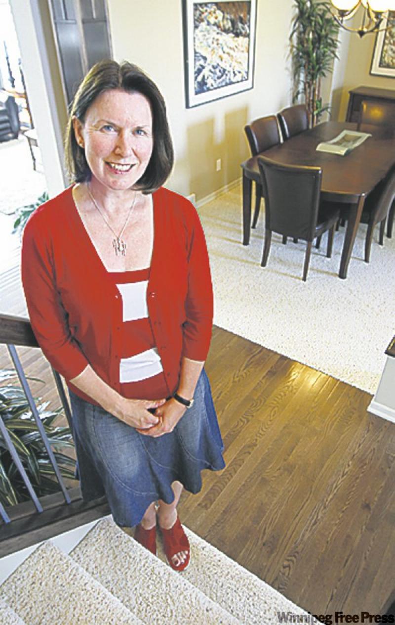 Ruth Rennie, sales representative for Sterling Homes, says despite what appears to be a trend, many of her cleints still prefer a separate living room and great room.
