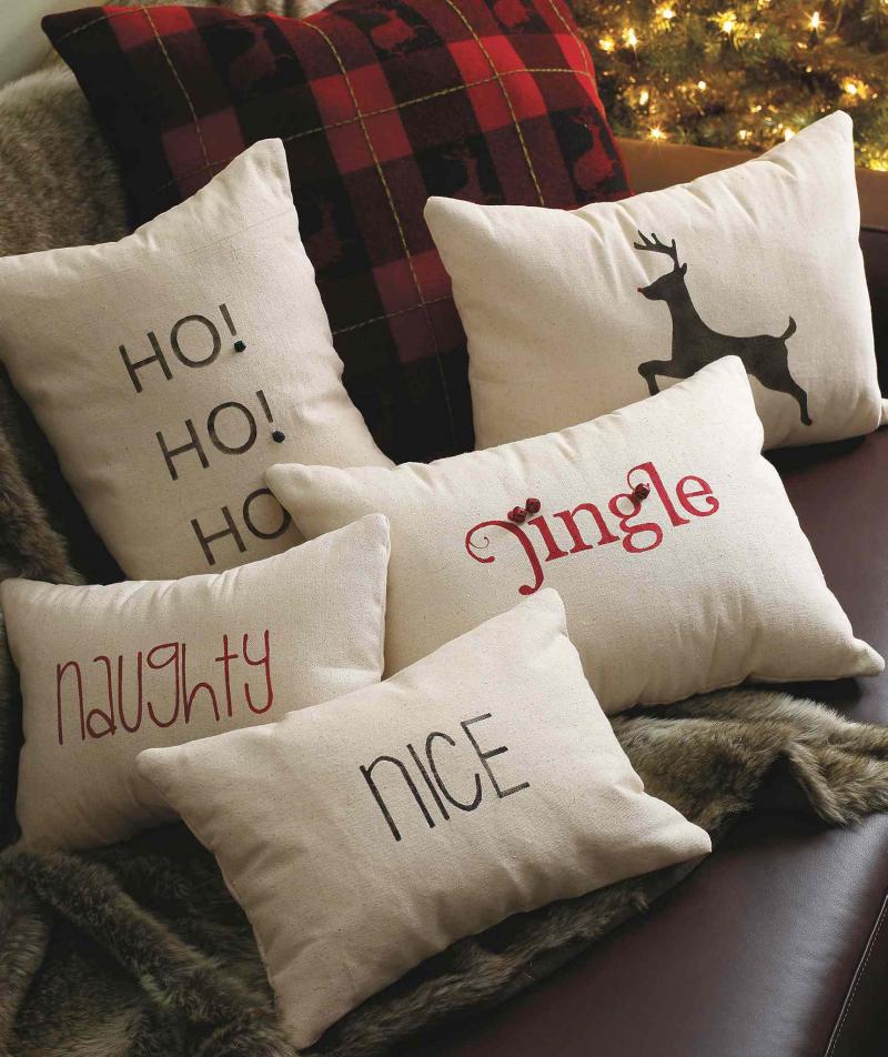 Above, festive pillows can be made from leftover canvas drop sheets and Beauti-Tone paint. At left, Christmas stockings made from canvas can be adorned with felt, bells or beads.