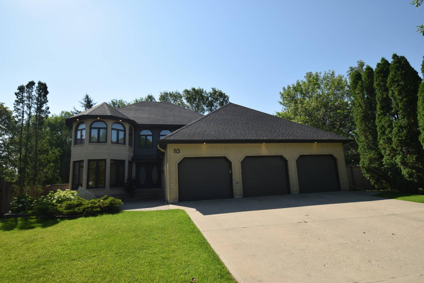  <p>Todd Lewys / Free Press</p>
                                <p>The stately looking two-storey home checks in at 2,878 sq. ft. and sits on a picturesque, mature lot on a quiet cul-de-sac.</p> 