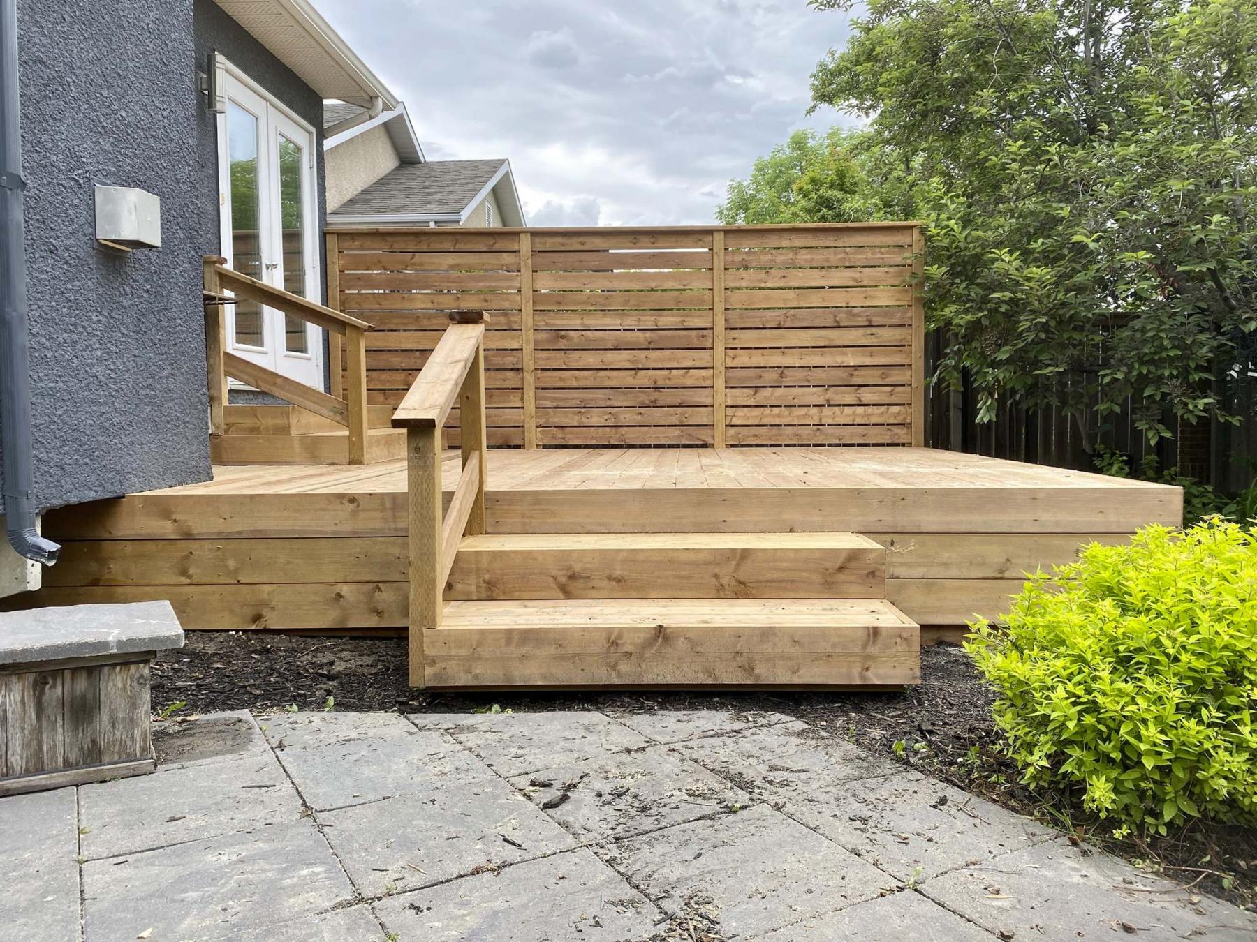 <p>Photos by Marc LaBossiere / Winnipeg Free Press</p><p>The deck layout allows access from ground-level to the deck surface, and patio doors.</p>