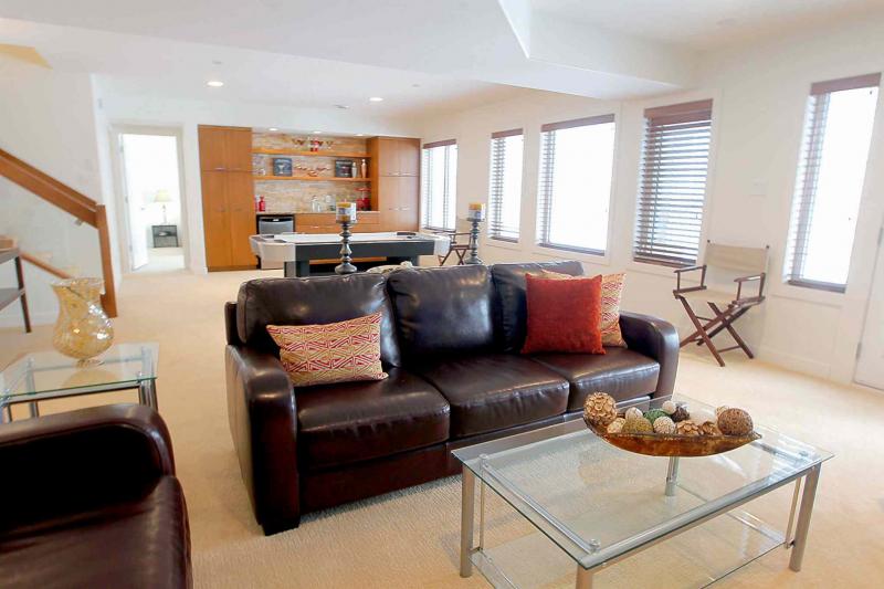 The lower level features an open-concept rec room, two bedrooms, a four-piece bath and loads of storage space.