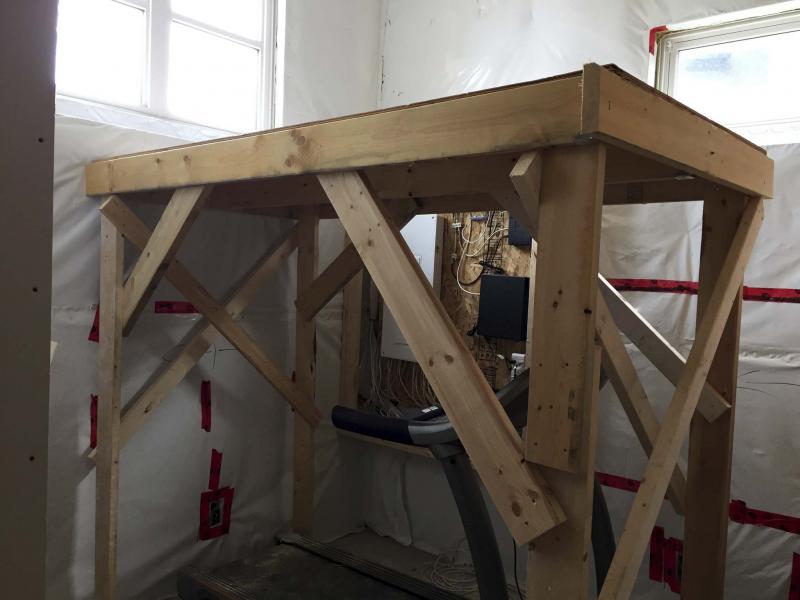 <p>Marc LaBossierre / Winnipeg Free Press</p><p>Parts that were allocated for the shower stall construction were first used to build a temporary eight-by-six-foot platform to perform tasks on the 13-foot ceiling below the split landing of a staircase.</p>