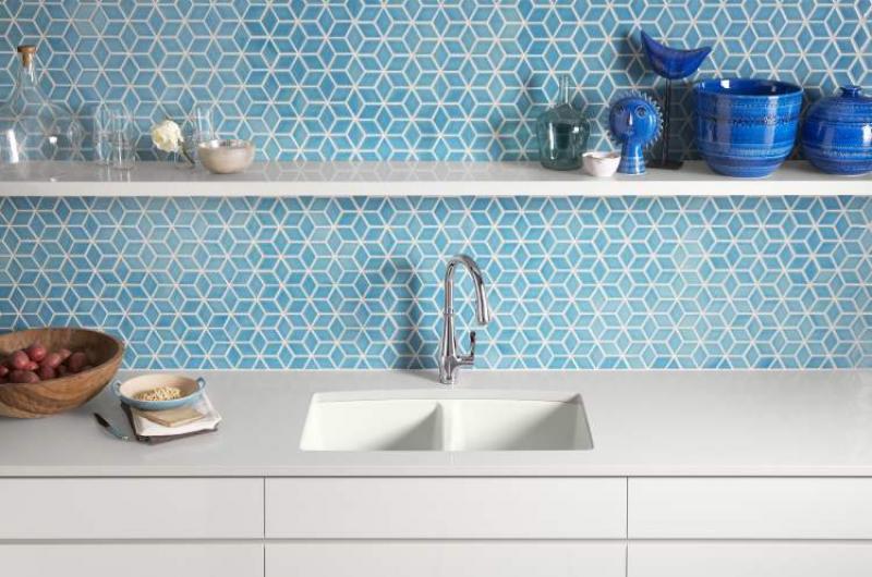 Above, below: The addition of the shelves helps break up what could have been a plain or boring backdrop. If you're faced with a similar situation, an expanse of boring wall space, consider installing a decorative shelf or two and create some focus in the room.