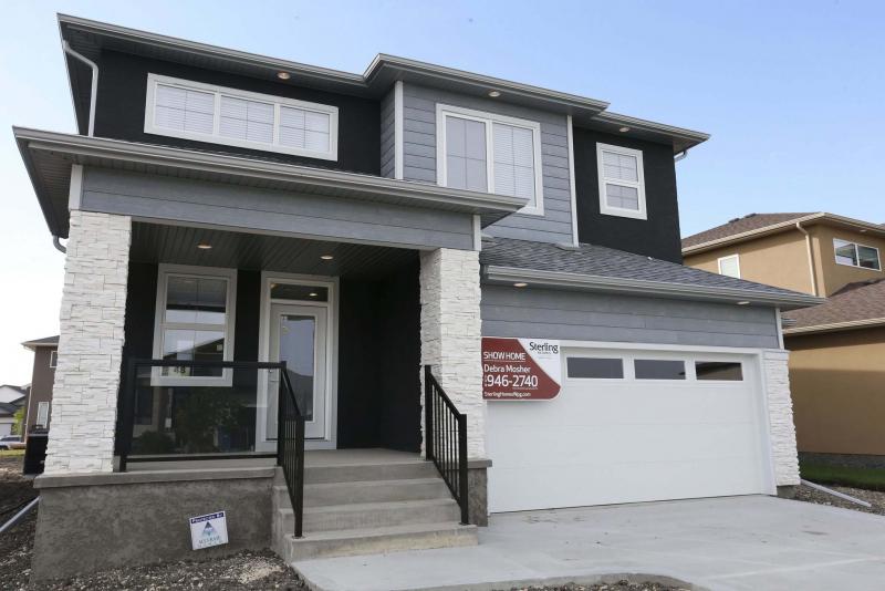 <p>WAYNE GLOWACKI / FREE PRESS FILES</p><p>Builders frequently display the community plans in their show homes in newer developments.</p></p>