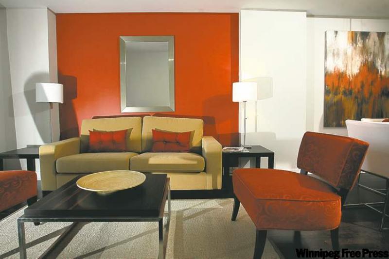 Rich red adds a punch of colour to the living room in the Galleria condo.