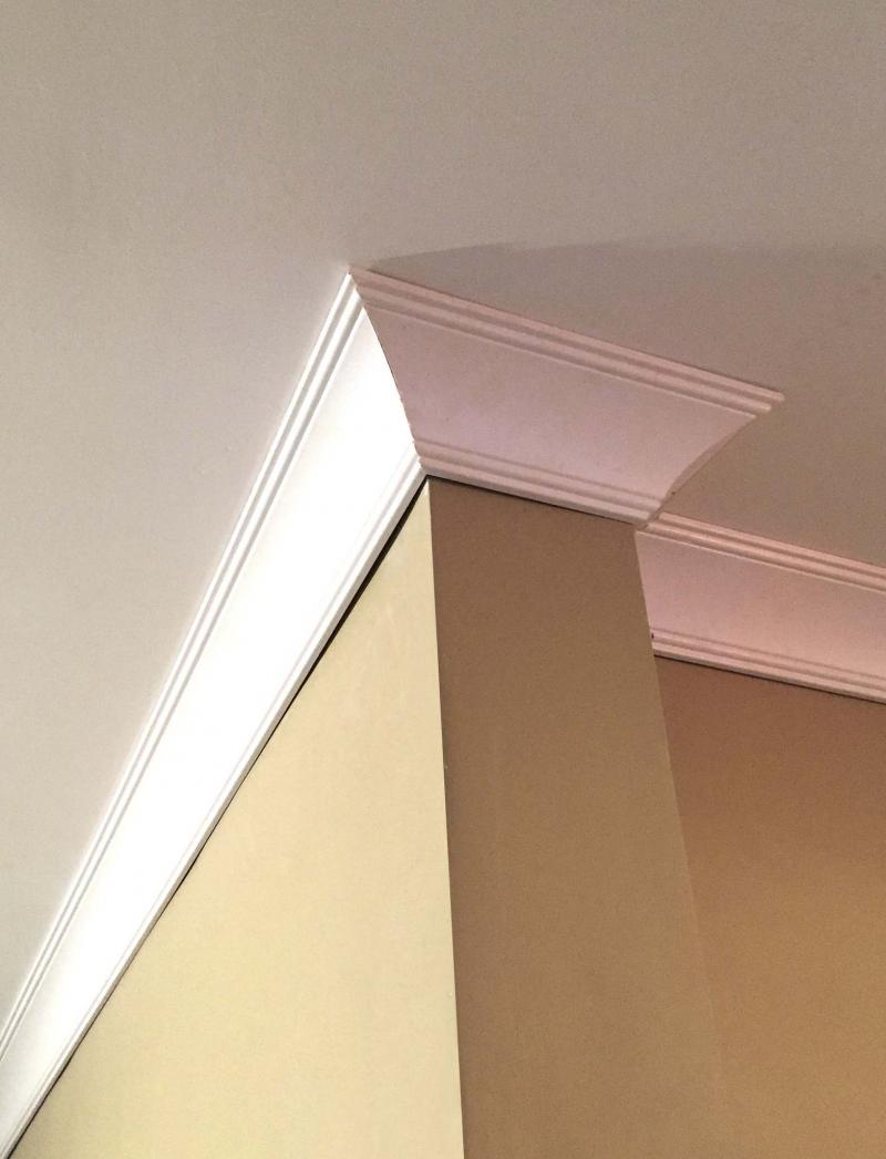 <p>45-degree spring angle crown mouldings installed at Roland Lavoie&rsquo;s house, after having strapped new drywall to the ceiling to cover up old plaster ceilings covered in stipple paint.</p>