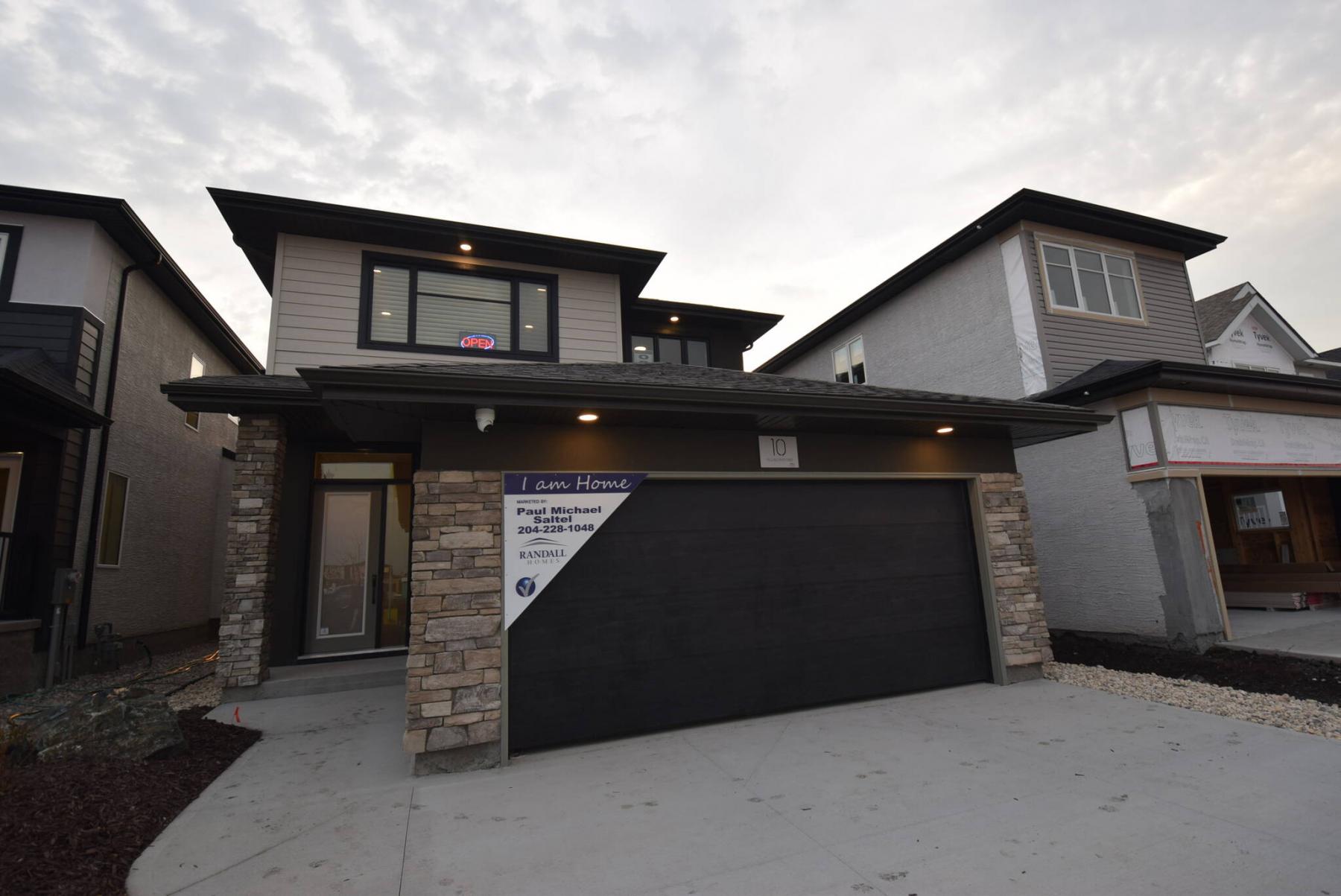  <p>Photos by Todd Lewys / Winnipeg Free Press</p>
                                <p>The Preston, a new two-storey plan, offers family-friendly style and function from top to bottom.</p> 