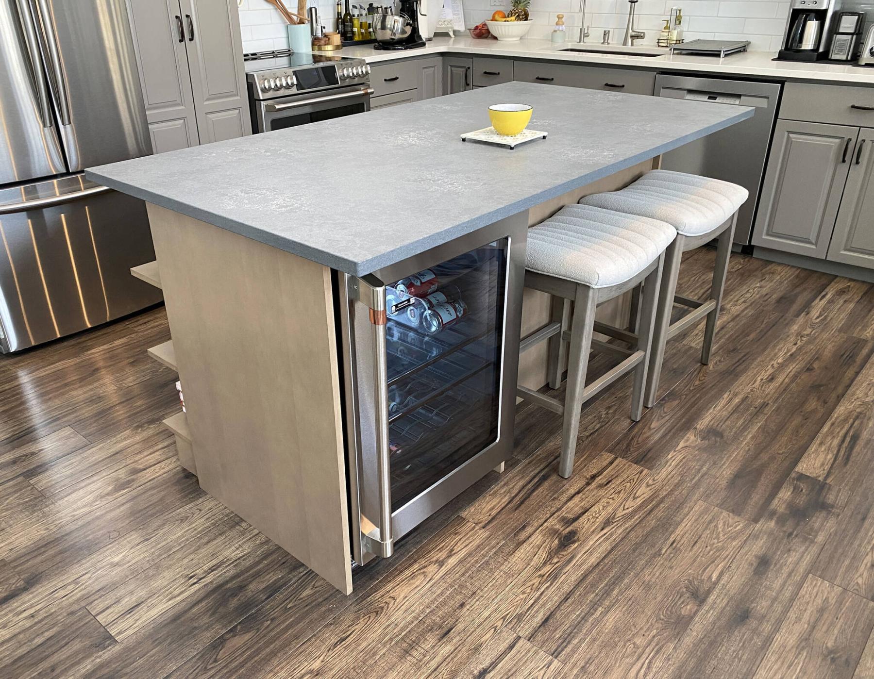  <p>MARC LABOSSIERE / FREE PRESS</p>
                                <p>A new bar fridge facing the dining room is incorporated into the island design.</p> 