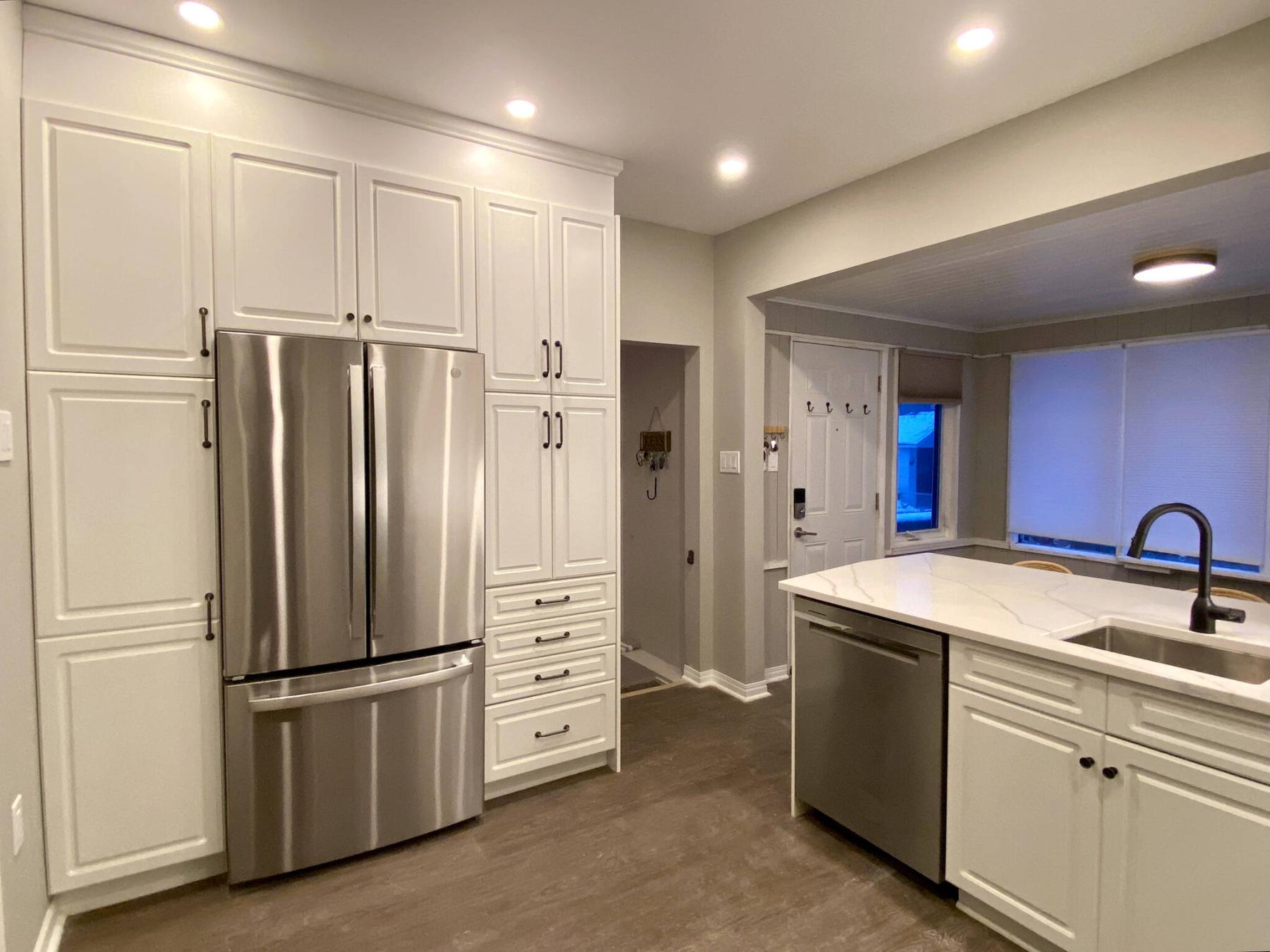  <p>Photos by Marc LaBossiere / Winnipeg Free Press</p>
                                <p>A new cabinet was added to compensate for the upper cupboards lost during the wall removal.</p> 
