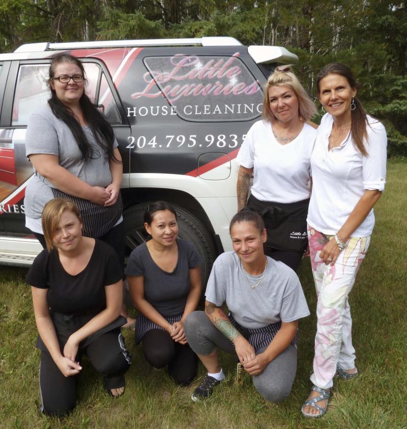 <p>Laurie Mustard / Winnipeg Free Press</p><p>Tammy (front row, from left), Maggie, Claire and Melissa (back row, from left), Carman and owner Lisa Manary make up the team at Little Luxuries Home and Carpet Cleaning.</p>