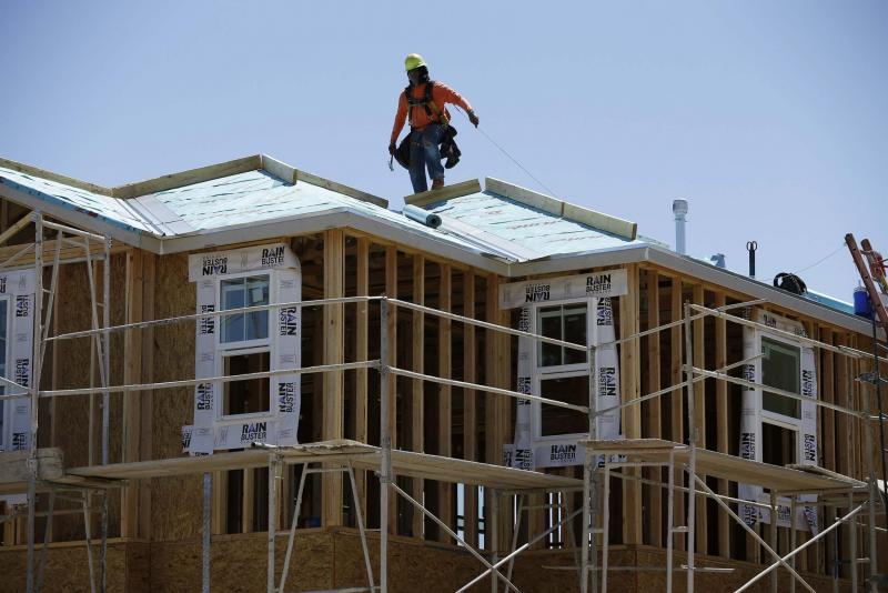 <p>John Locher / The Associated Press</p><p>Some have suggested a capital gains tax or a tax on flipping houses in an effort to target foreign investors profiting from the real estate market. </p>