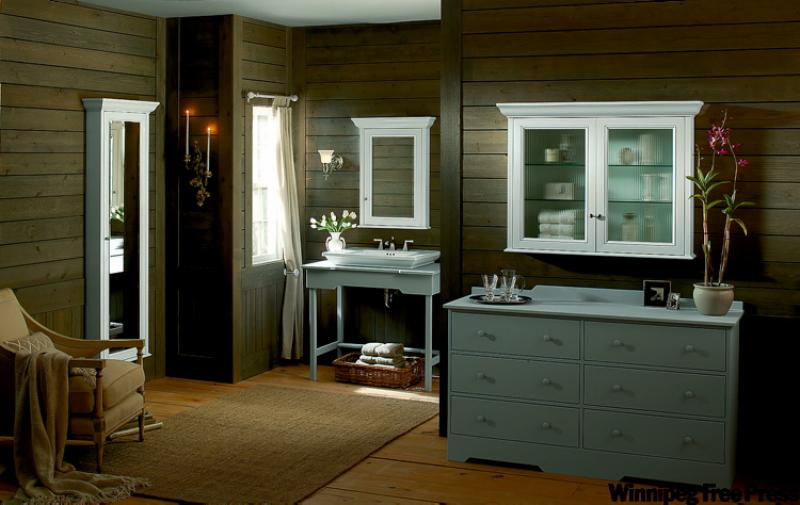 Your cottage bathroom isn't likely to be this large, but this display by Kohler contains some great ideas, from the plank flooring to the tongue-in-groove walls.