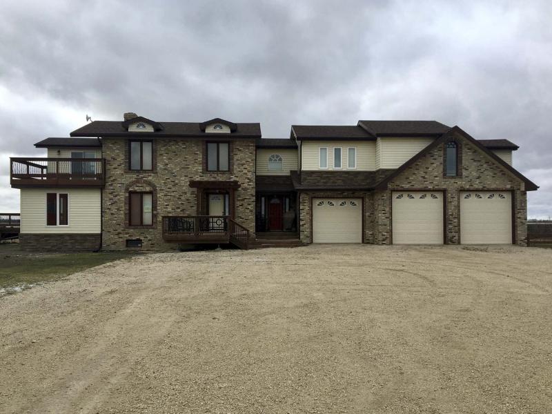 <p>Photos by Marc LaBossiere / Winnipeg Free Press</p><p>Marc&rsquo;s south-side addition exterior complete, finished by Render Construction with matching vinyl siding and the introduction of faux, which was also included in a lineal pattern on the existing portion of the house</p></p></p>