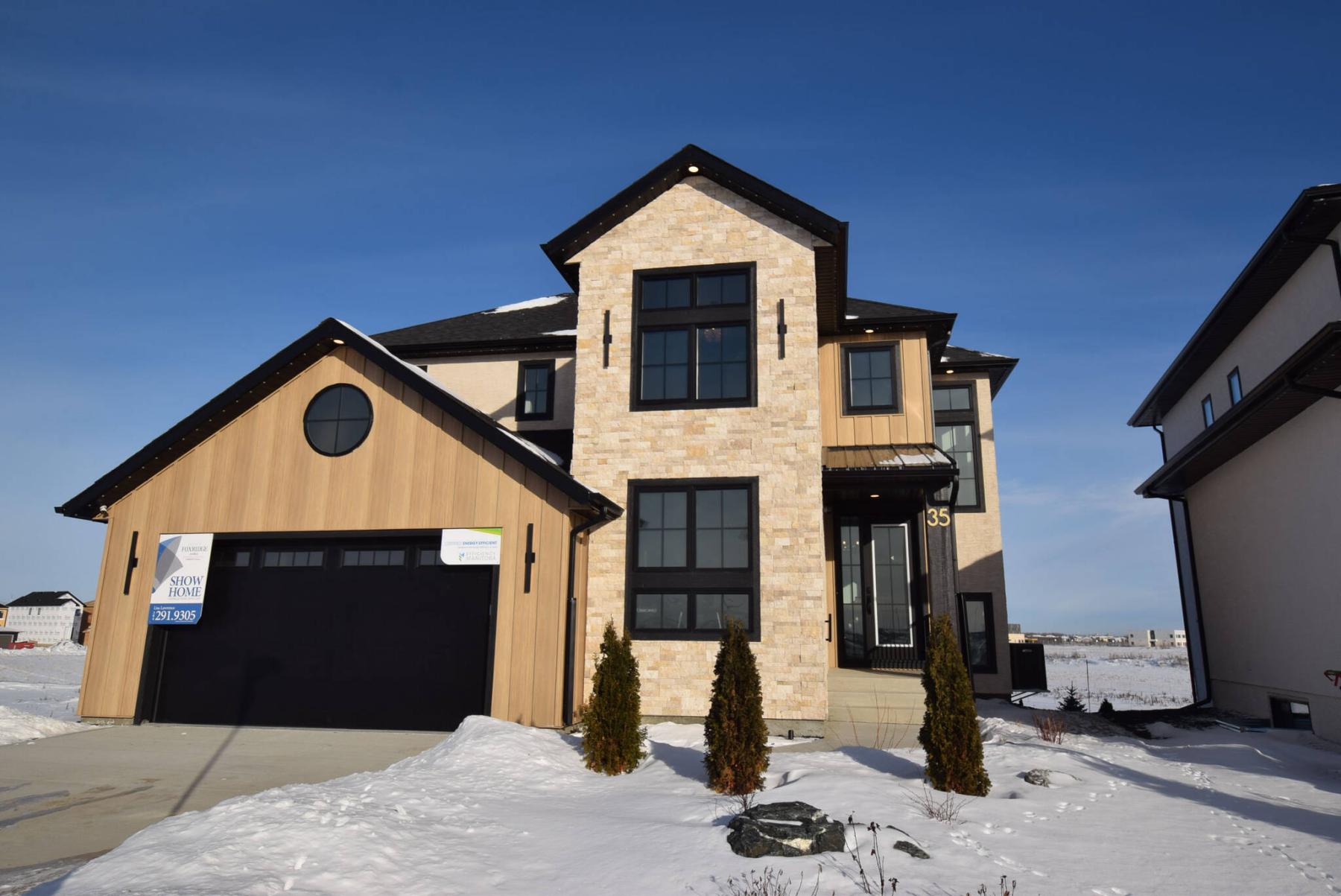  <p>TODD LEWYS / FREE PRESS</p>
                                <p>Though grand in every respect, the 2,855-sq.-ft., two-storey design deftly balances elegance and efficiency.</p> 