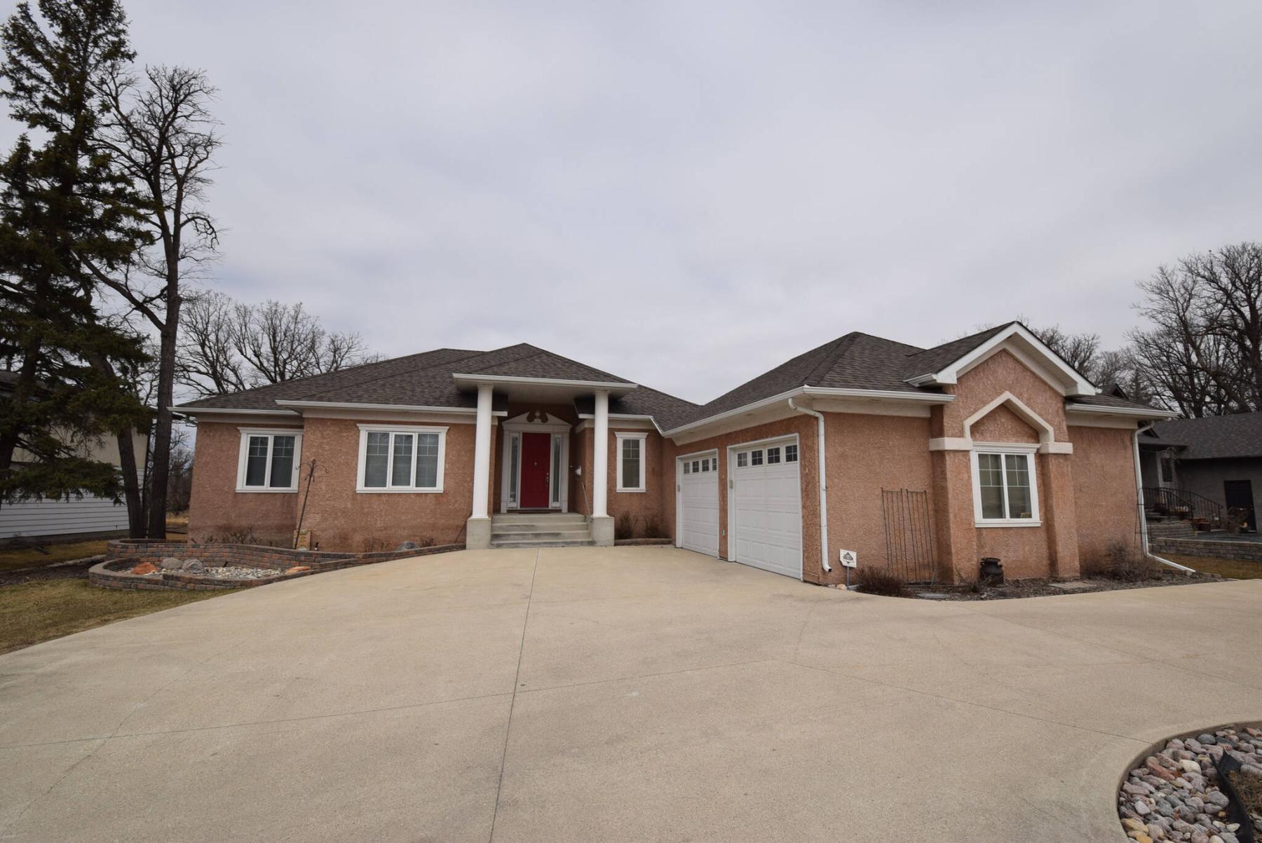  <p>TODD LEWYS / FREE PRESS</p>
                                <p>Custom-built in 2005, the meticulously maintained home sits on a huge riverside lot, offering practical luxury in a rustic setting just minutes from city conveniences.</p> 