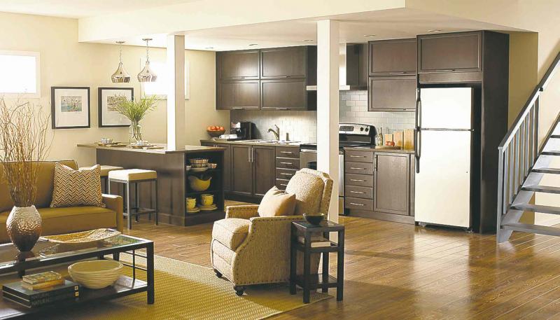 The furniture in this lower-level suite is warm and inviting in shades of camel and tan upholstery.