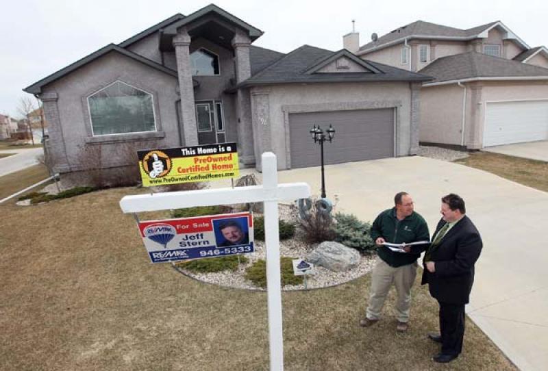 Realtor Jeff Stern, right, and home inspector Tom van Leeuwen hope Stern's Pre-Owned Certified program helps ease buyer anxiety and maximise offers for sellers.
