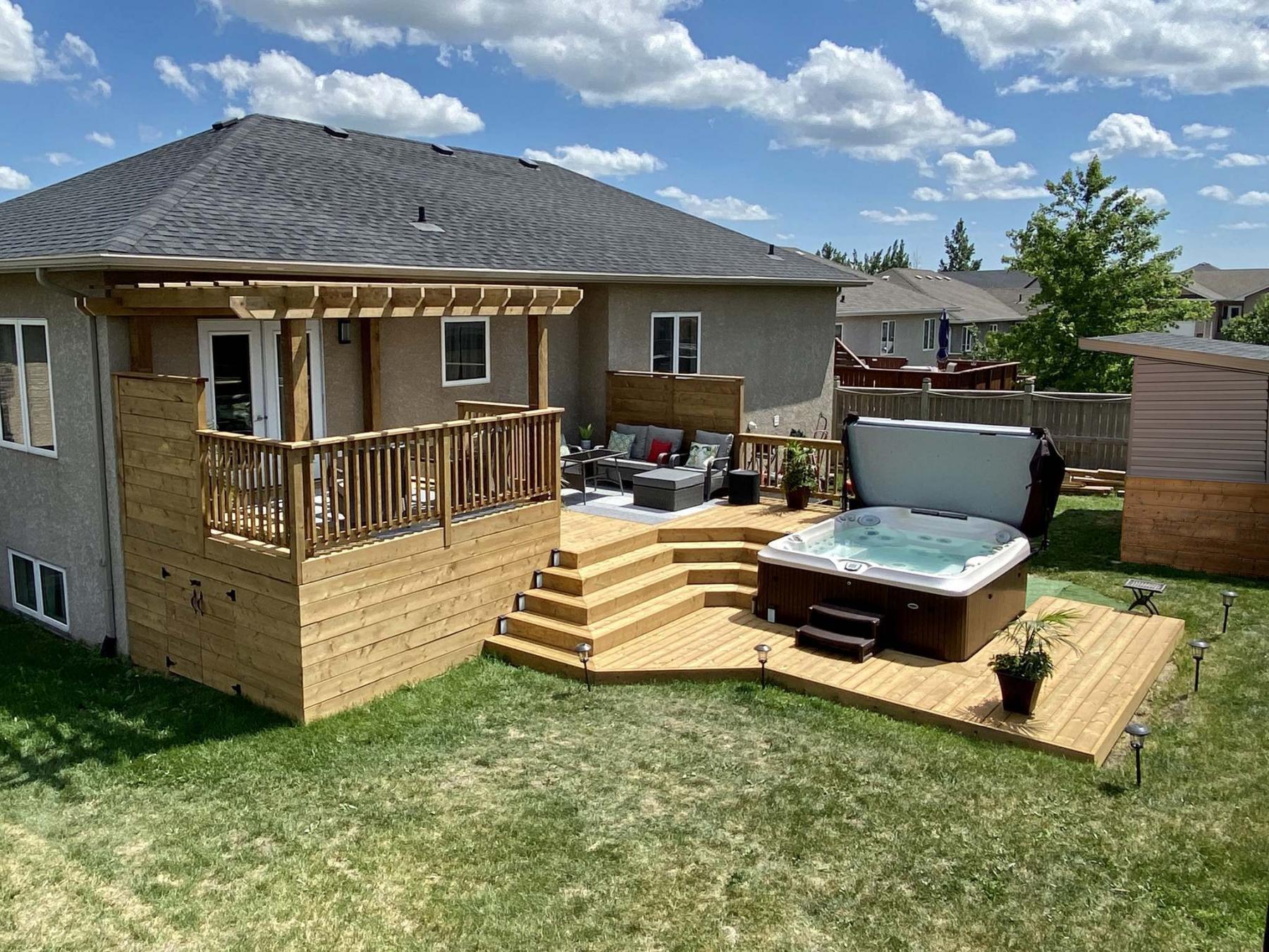 <p>Marc LaBossiere / Winnipeg Free Press</p><p>The new deck and pergola allows visitors to approach and step onto the deck the moment they enter the backyard. </p>