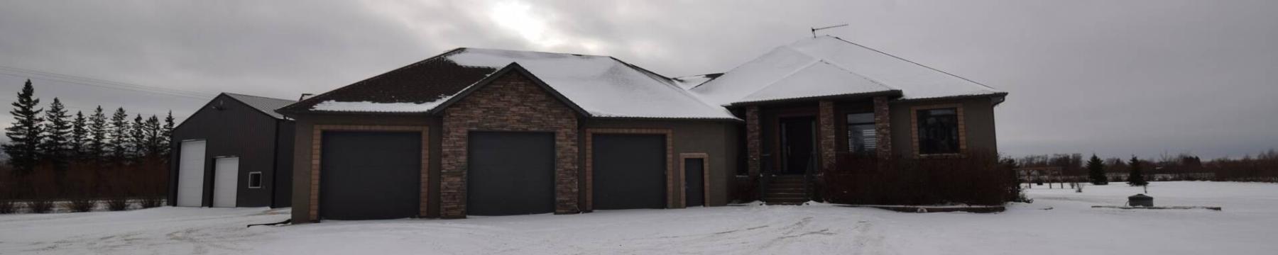  <p>Photos by Todd Lewys / Free Press</p>
                                <p>Just 10 years old, the well-maintained 2,261-sq.-ft. bungalow is on a large four-acre lot and features a 48-by-40-foot shop.</p> 