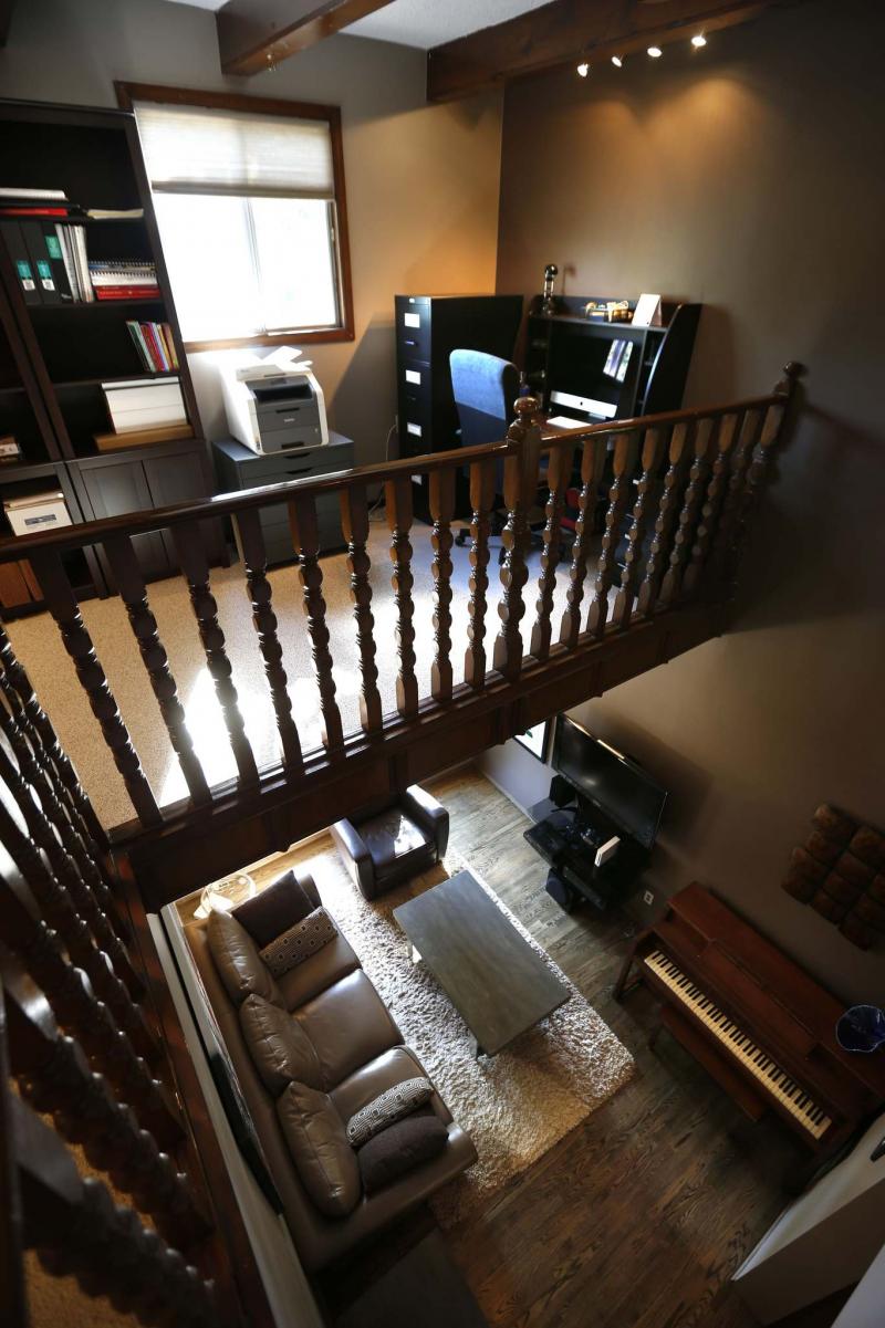 <p>The view from the second-floor office overlooking the living room. </p>