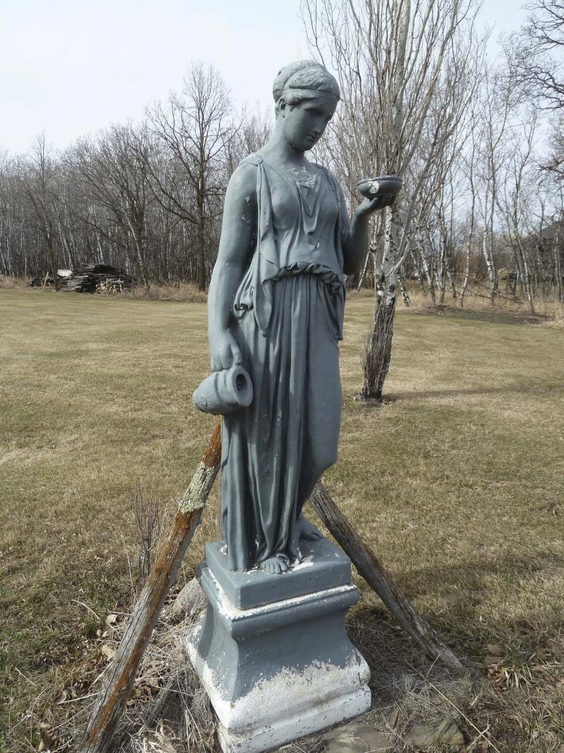 <p>A statue of Hebe, daughter of Zeus, Laurie Mustard wants to relocate closer to the house.</p>
