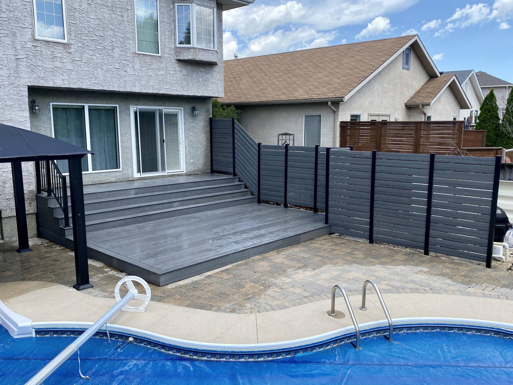  <p>Marc LaBossiere / Winnipeg Free Press</p>
                                <p>Once the deck&rsquo;s low tier elevation was modified to ground-level, the entire structure was sheathed in grey composite.</p> 
