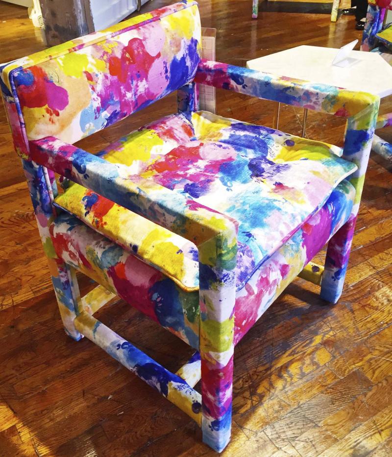 <p>Patricia Sheridan / Pittsburgh Post-Gazette </p><p>Highland House's Morehead chair is upholstered head to toe in a splashy, colorful, painterly velvet from Italy. </p>