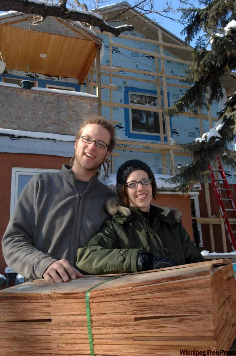 Regina builders Eric and Rachel Penner de Waal and his wife Rachel with B.C. cedar shingles certified by the Forest Stewardship Council.