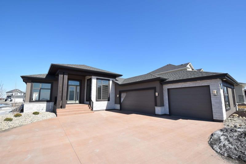 <p>Photos by Todd Lewys / Winnipeg Free Press</p><p>This Prairie Grass Lane bungalow, built by Avanti Custom Homes, makes the most of massive windows to flood its spacious interior with natural light.</p>