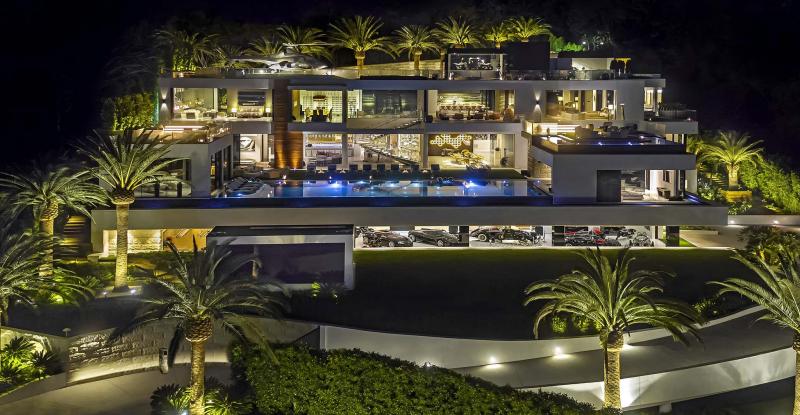 <p>The 38,000-square-foot spec house in Bel-Air took four years and 250 workers to build. A $30-million car collection, custom furnishings and a range of amenities are included in the $250-million price tag. (Bruce Makowsky/BAM Luxury Development)</p>