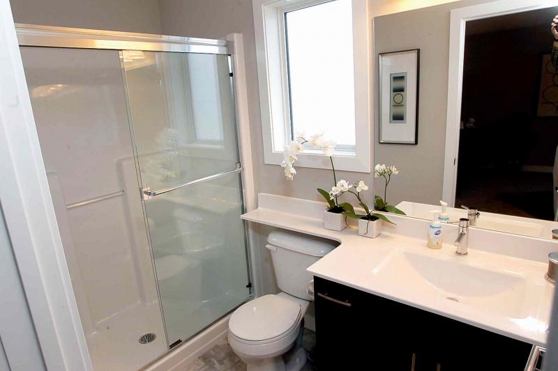 The master suite includes a three-piece ensuite.