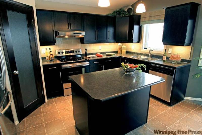 The kitchen was enlarged to enhance versatility and functionality.