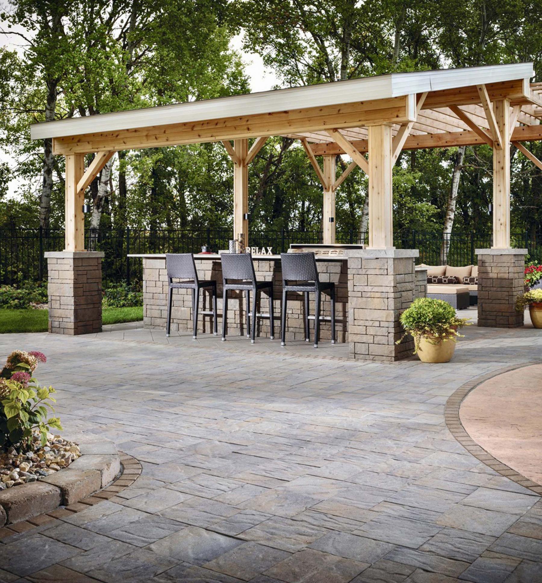 <p>Use paving stone for the living area around your outdoor kitchen for significant cost savings.</p>