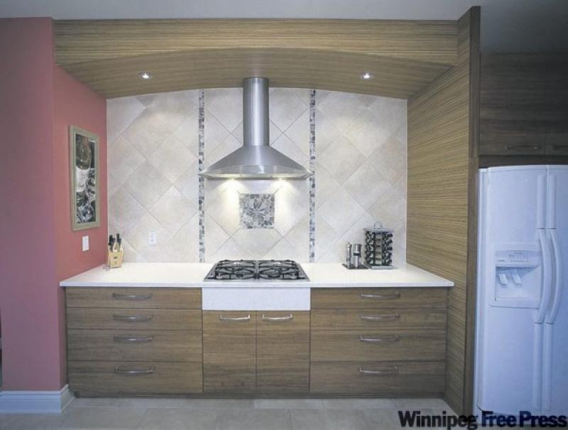 A charming, and green, alternative to wood -- which often involves old-growth trees that take decades to regrow -- is bamboo, seen here as cupboard fronts and wall covering. It is most often used as f