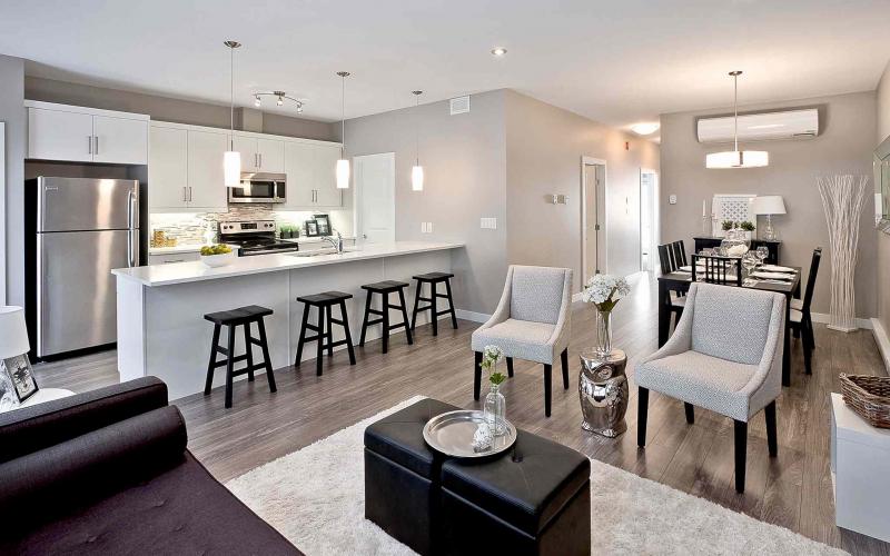 The dining room/kitchen area of The Nash is stylish and functional thanks to its high finishing quality and open-concept layout.