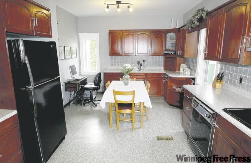 While the home has been brought up to 21st-century standards for convenience and modern living, much of its original charm -- wood mouldings, hardwood floors -- remains.
