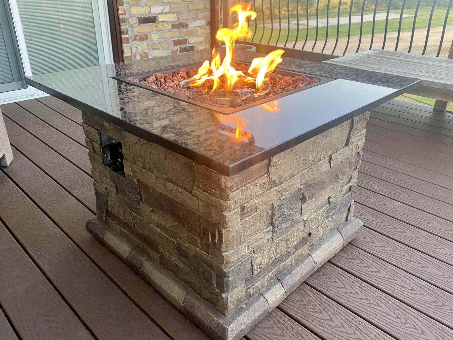 <p>The fire table is a perfect addition to the second-floor balcony. (Marc LaBossiere / Winnipeg Free Press)</p>