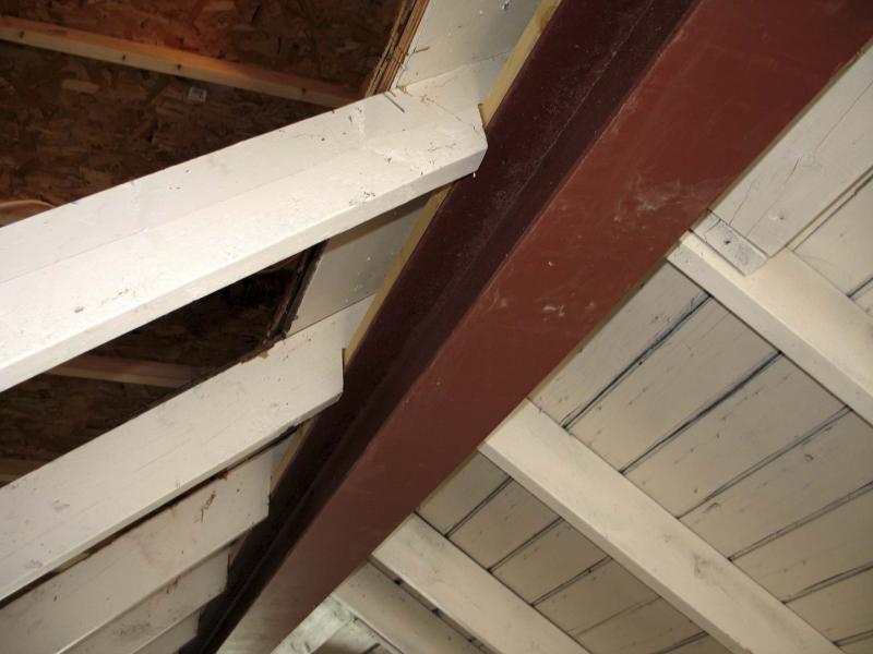 <p>Photos by Marc LaBossiere / Winnipeg Free Press</p><p>The I-Beam hoisted into its permanent position and set into notches of the existing rafters in my garage.</p>
