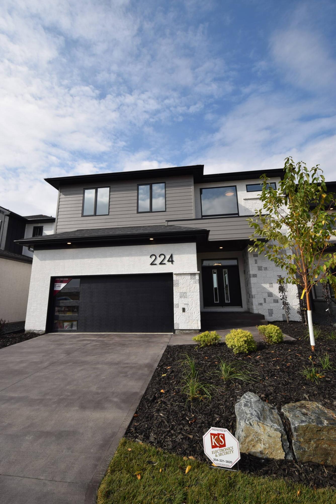  <p>Photos by Todd Lewys / Winnipeg Free Press</p>
                                <p>This large two-storey home features a creative yet functional design both inside and out.</p> 