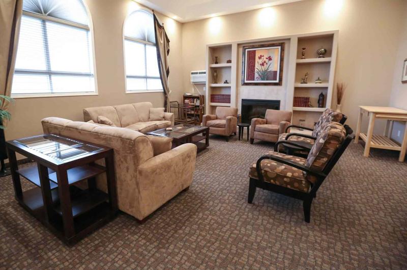 This Tuxedo Park condo offers a rectangular living area that is well laid out and spacious.
