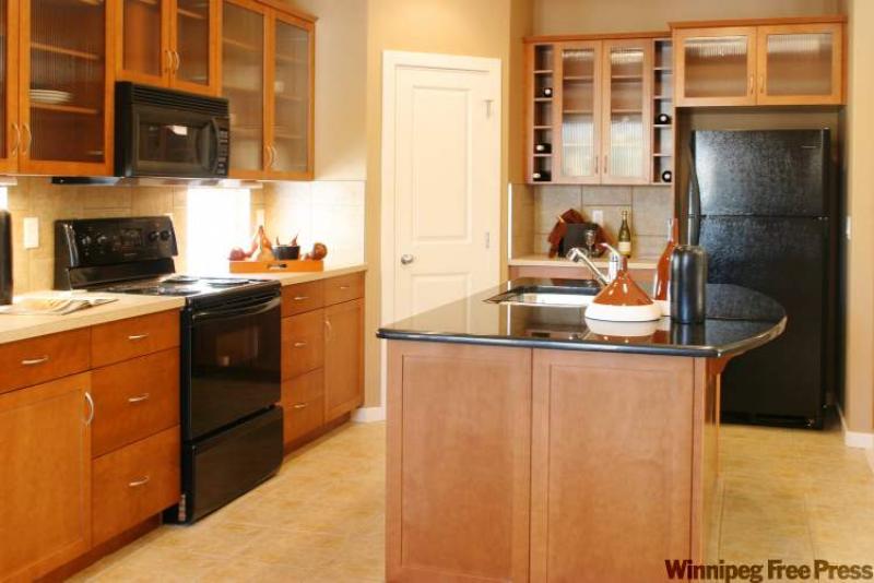 Glass-fronted cabinets are a wonderful look as long as you can keep your cupboards clean and tidy all the time.